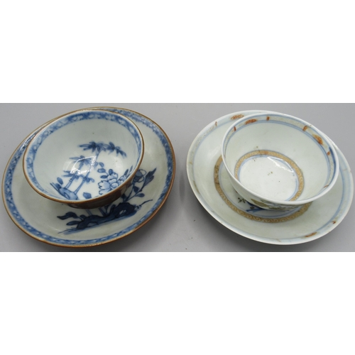 1049 - Two Nanking cargo porcelain tea bowls and saucers, both with tree and floral decoration, cup D7.5cm