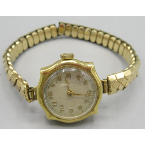 503 - Ladies Swiss 18ct gold wristwatch on gold plated expanding bracelet, silvered dial, pressed gilt Ara... 