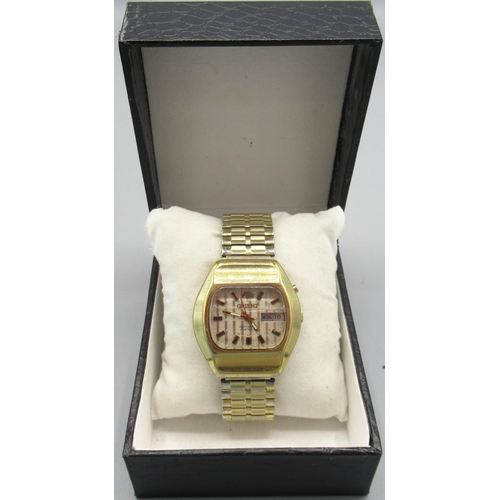 518 - Orient gold plated automatic wristwatch with quick set day date, signed striped dial, applied baton ... 