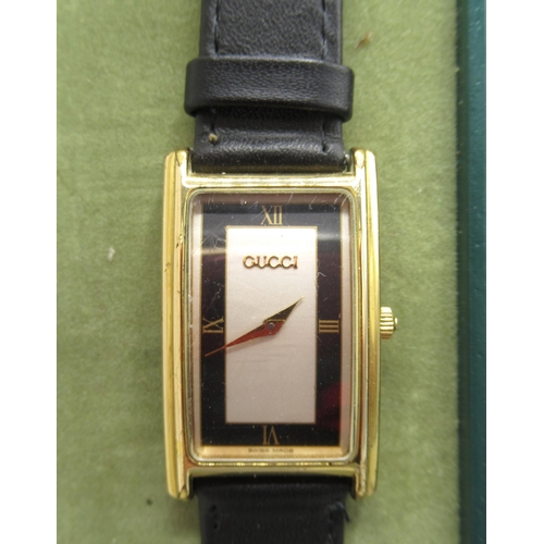 522 - Gucci 2600 M tonneau gold plated quartz wristwatch, signed tuxedo Roman dial, signed snap on case ba... 