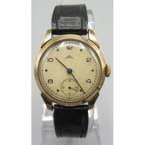 535 - 1940's Majex 9ct rose gold wristwatch, signed parchment coloured dial, alternating Arabic and dot in... 