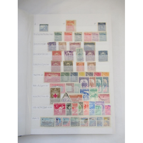 630 - Eleven stamps folders cont. International stamps from Poland, St. Vincent, St. Lucia, Guinea, Romani... 