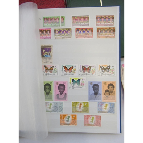 630 - Eleven stamps folders cont. International stamps from Poland, St. Vincent, St. Lucia, Guinea, Romani... 