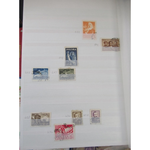 630 - Eleven stamps folders cont. International stamps from Poland, St. Vincent, St. Lucia, Guinea, Romani... 