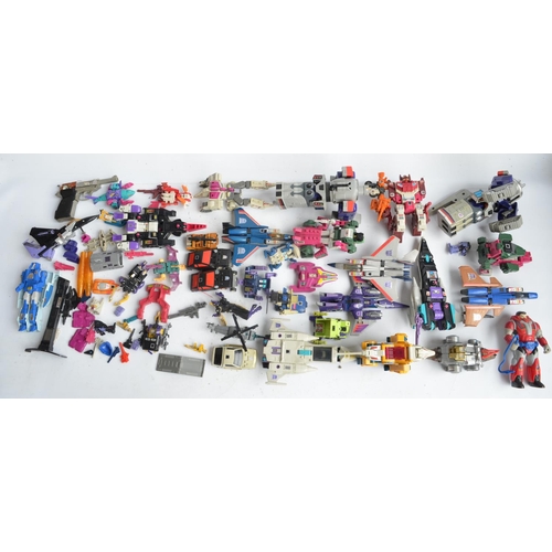 243 - Large collection of previously used Transformers action figures and models, accessories, manuals, em... 