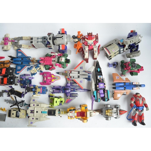 243 - Large collection of previously used Transformers action figures and models, accessories, manuals, em... 