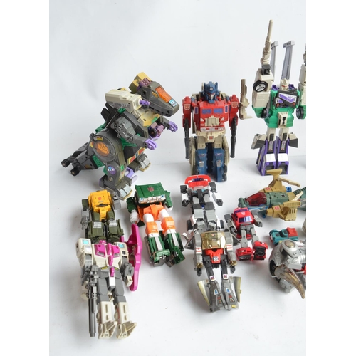 243 - Large collection of previously used Transformers action figures and models, accessories, manuals, em... 