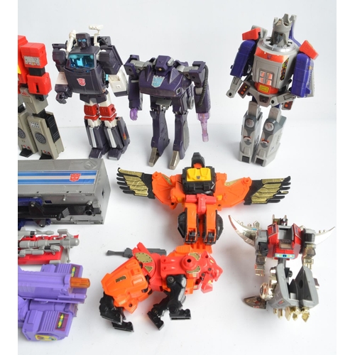 243 - Large collection of previously used Transformers action figures and models, accessories, manuals, em... 