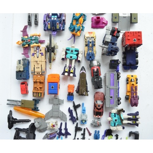 243 - Large collection of previously used Transformers action figures and models, accessories, manuals, em... 