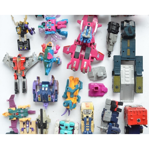 243 - Large collection of previously used Transformers action figures and models, accessories, manuals, em... 