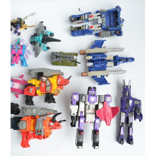 243 - Large collection of previously used Transformers action figures and models, accessories, manuals, em... 