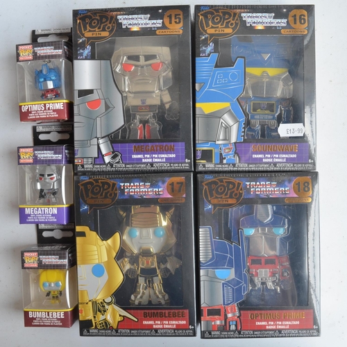 244 - Collection of Transformers themed Funko Pops models to include 4x enamel pin badges, 3 Pocket Pops k... 