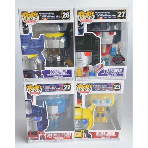 244 - Collection of Transformers themed Funko Pops models to include 4x enamel pin badges, 3 Pocket Pops k... 