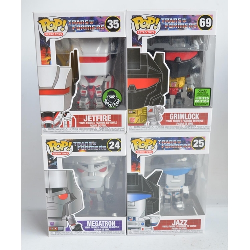 244 - Collection of Transformers themed Funko Pops models to include 4x enamel pin badges, 3 Pocket Pops k... 