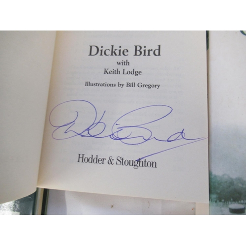 834 - Collection of Cricket related books (some being signed by Dickie Bird) to inc. 25 Wisdens covering v... 