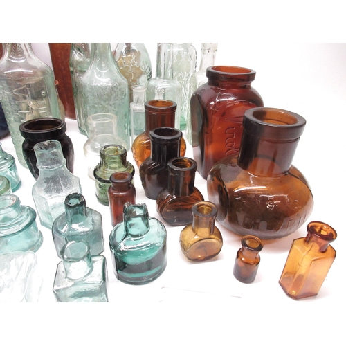 1068 - Large collection of various stoneware and glass bottles incl. poison bottles, Bovril bottles, codd-n... 