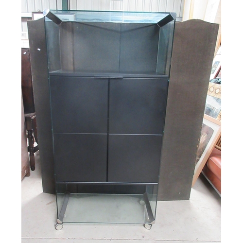 628 - Gallotti & Radice side black finished and clear glass three-tier side cabinet, on casters, W80cm D40... 