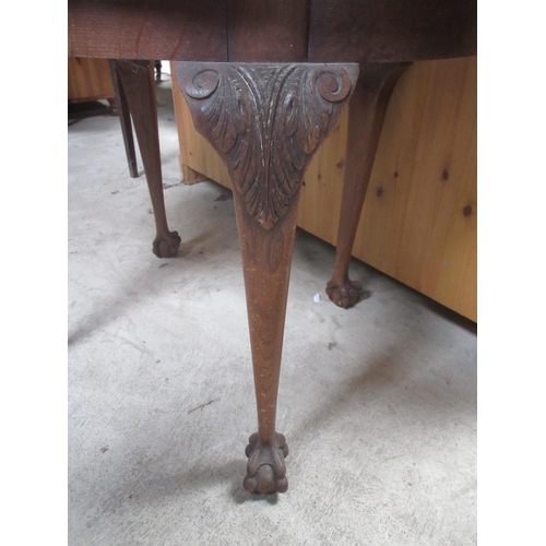 736 - Geo. 111 style oak oval occasional table, on scroll carved legs with claw and ball feet, W89cm D56cm... 