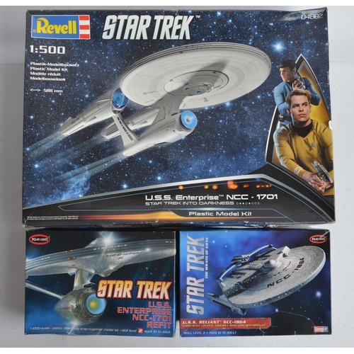 116 - Three Star Trek themed plastic model kits to include Revell 1/500 scale USS Enterprise (item no 0488... 