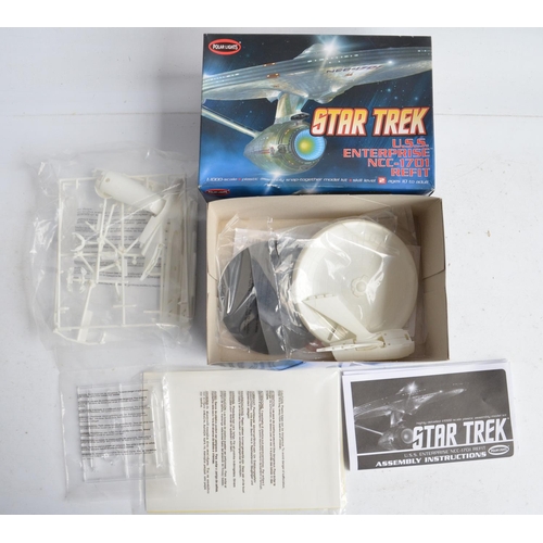 116 - Three Star Trek themed plastic model kits to include Revell 1/500 scale USS Enterprise (item no 0488... 