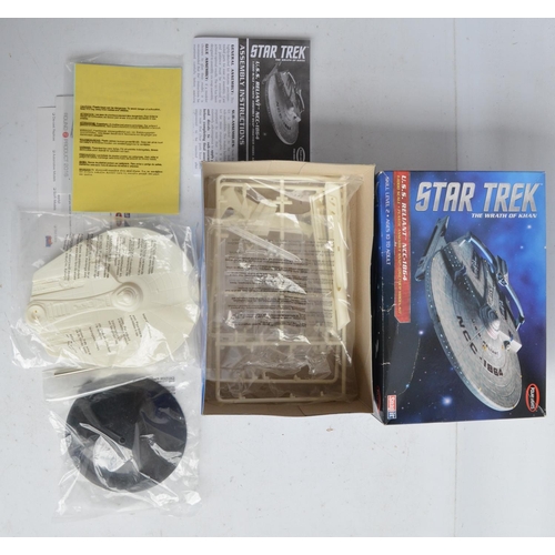 116 - Three Star Trek themed plastic model kits to include Revell 1/500 scale USS Enterprise (item no 0488... 