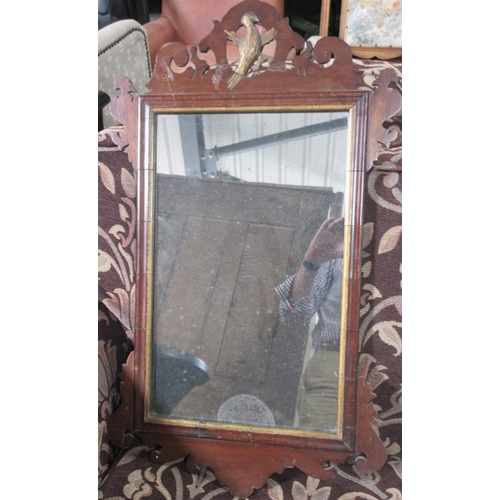 758 - Geo.111 style mahogany wall mirror, fretwork frame with gilt eagle cresting, H79cm W46cm