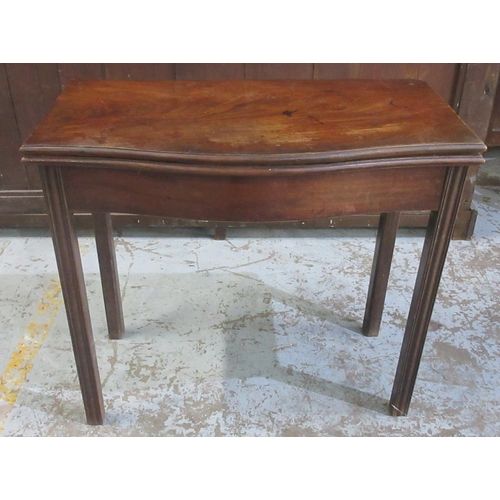 634 - Geo.111 mahogany serpentine front tea table, folding top on moulded supports, W86cm D94cm H74cm max