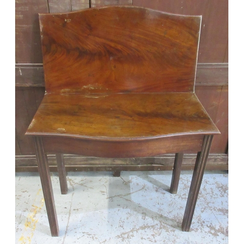 634 - Geo.111 mahogany serpentine front tea table, folding top on moulded supports, W86cm D94cm H74cm max