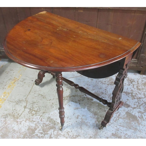 636 - Victorian mahogany Sutherland table, two d shaped leaves on pierced end supports with brass sockets ... 