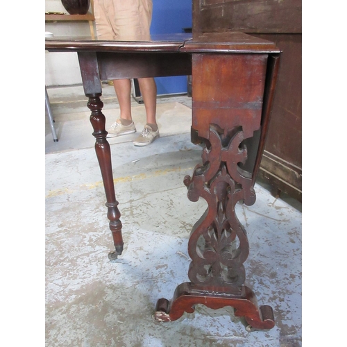 636 - Victorian mahogany Sutherland table, two d shaped leaves on pierced end supports with brass sockets ... 