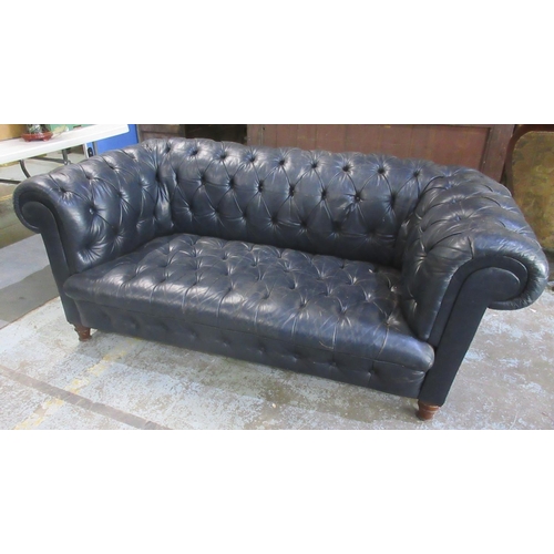 638 - Victorian Chesterfield sofa, later reupholstered in buttoned blue leather, on turned supports, W190c... 