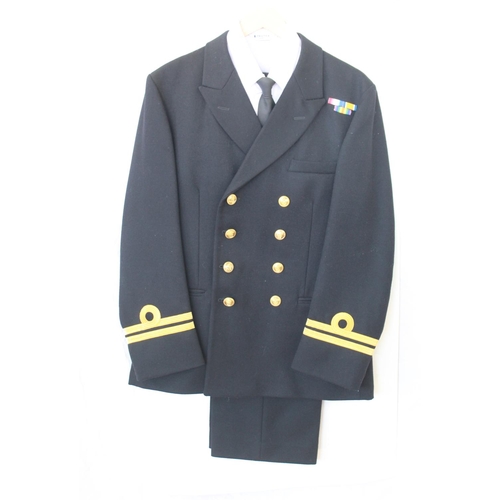 1373 - Royal Naval Officers Uniform. Lieutenant's Rank with medal ribbons. Cap, Jacket, Trousers, Shirt and... 