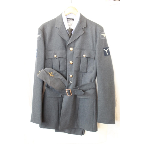 1376 - R.A.F. Uniform for Leading Aircraftsman, with insignia and brass buttons. Side cap, Jacket, trousers... 