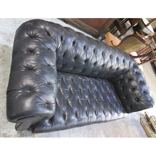 638 - Victorian Chesterfield sofa, later reupholstered in buttoned blue leather, on turned supports, W190c... 