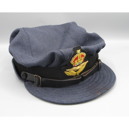 1332 - Women's Royal Air Force (WRAF) 'Kattenburg's Ltd' raincoat with cap. Size 170/92