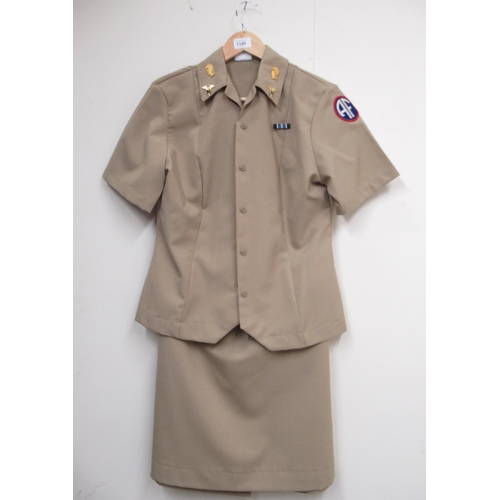 1340 - U.S. Army women's officer tunic with skirt, with WWII nurse badges and a Berlin Airlift Humane Actio... 