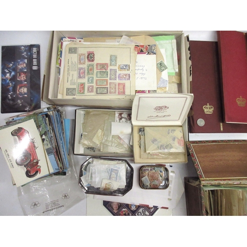 1079 - Collection of All World and GB stamps, loose and in albums, mixed collection of postcards, framed 'T... 