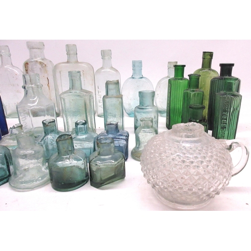 229 - Collection of glass bottles incl, green, blue and amber ribbed poison bottles, dimpled 'hedgehog' be... 