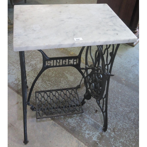 644 - Cast iron Singer treadle sewing machine base with later white marble top, W58cm D41cm H74cm