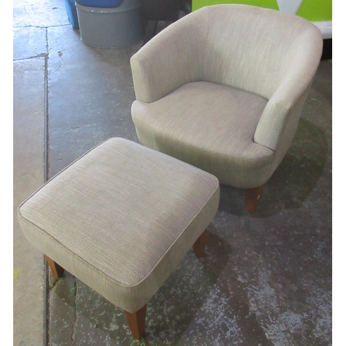 645 - Next tub type arm chair and rectangular footstool, upholstered in grey Herringbone fabric (2)