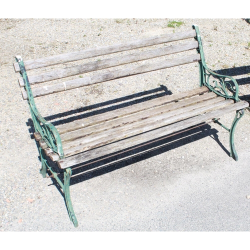 1272 - Small garden bench with with alloy ends and eight wooden slats, W112cm D35cm H69cm