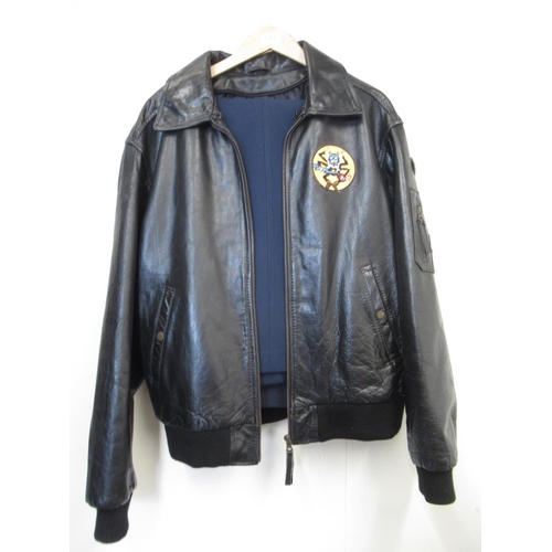 1353 - Leather bomber jacket (L) with Tactical Air Command patch to right sleeve and U.S. Army 507th Parach... 