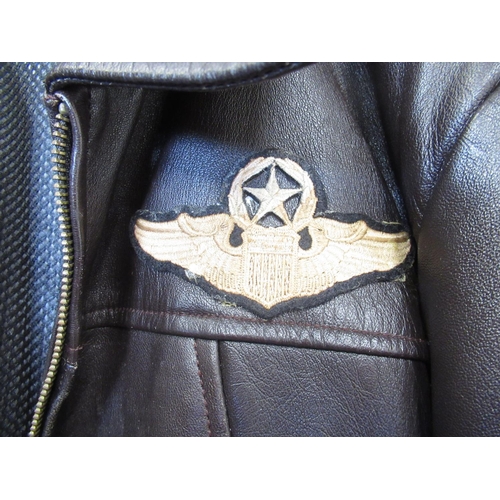 1354 - Leather bomber jacket (XL) with Air Combat Command patch to left arm, U.S. Air Force badge to left s... 