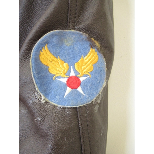 1356 - U.S. Air Force leather bomber jacket (L) with U.S. Army Air Force patch to left sleeve and U.S.A.A.F... 