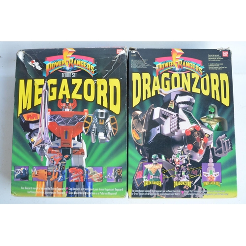 265 - Two deluxe Power Ranger sets from Bandai to include Megazord (with instructions) and Dragonzord, bot... 