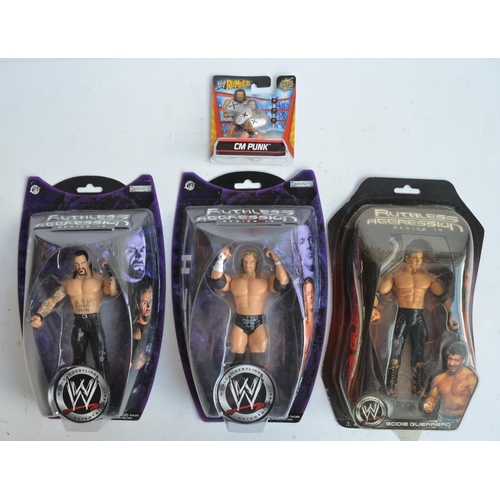 267 - Collection of Wrestling, MMA and UFC action figures and caricature figurines (approx 6