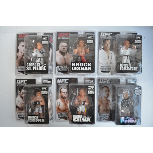 267 - Collection of Wrestling, MMA and UFC action figures and caricature figurines (approx 6