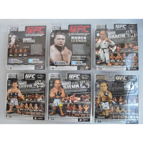 267 - Collection of Wrestling, MMA and UFC action figures and caricature figurines (approx 6