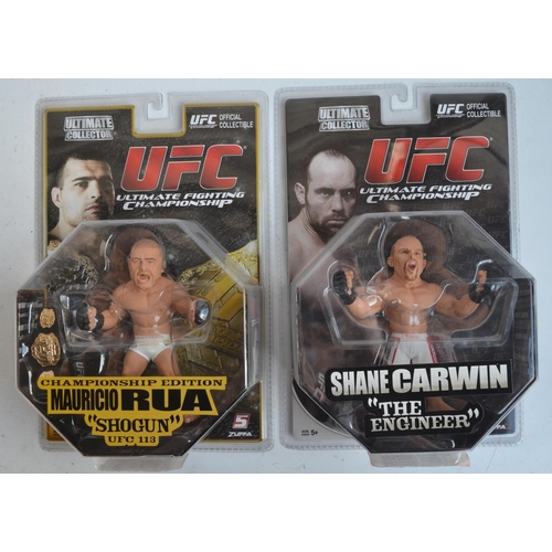 267 - Collection of Wrestling, MMA and UFC action figures and caricature figurines (approx 6