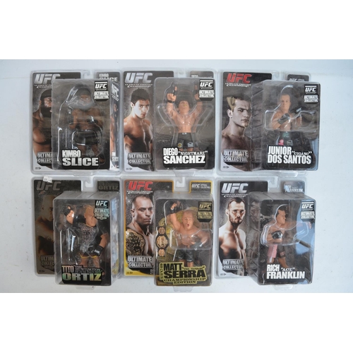 267 - Collection of Wrestling, MMA and UFC action figures and caricature figurines (approx 6